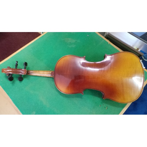 72 - A Full size violin in a Rushworth and Dreaper in fitted case with two bows one marked Roth Glasser.