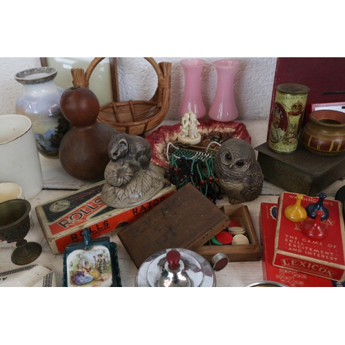 615 - A mixed lot of  kitsch, vintage, tourist, dateline ceramics, games etc.. carton not included