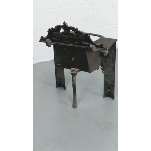 631 - A cast fire place measuring approx' 46cmW x 64H. together with an ornate six branch brass ceiling li... 