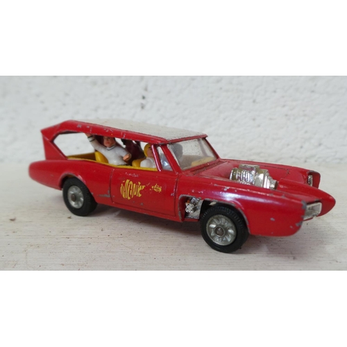 50 - A group of Corgi TV themed vehicles; 2 x 007 Aston Martins, one with both passenger and driver, the ... 