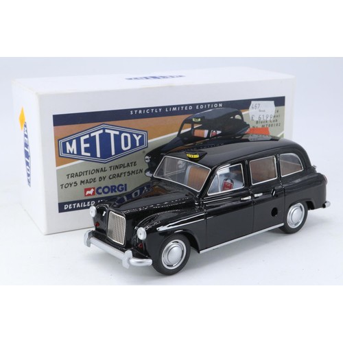 111 - Mettoy Corgi tin plate black cab MT00102 with original box