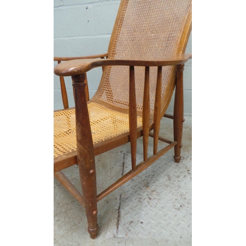 700 - An oak and cane chair