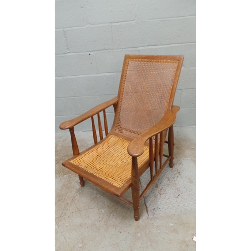 700 - An oak and cane chair