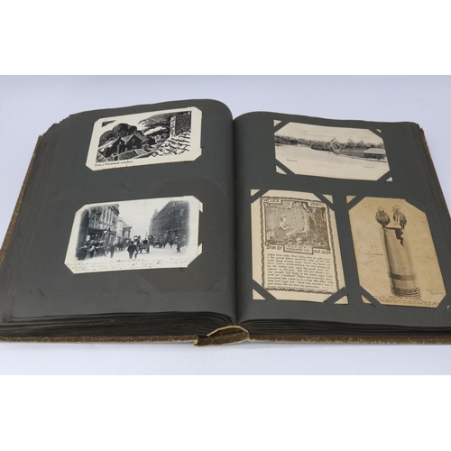 138 - A 1914 postcard album containing approx. 300 vintage postcards