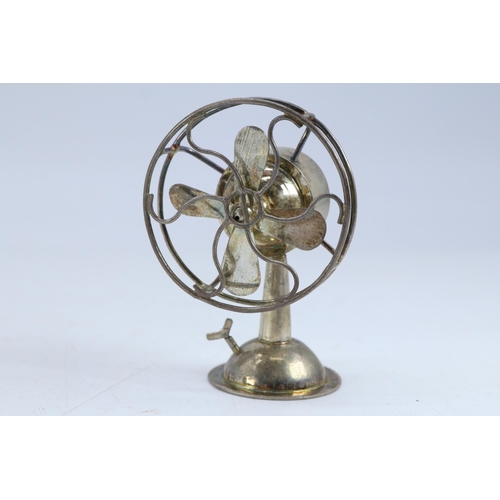 23 - White metal silver? miniature desk fan with rotating blade