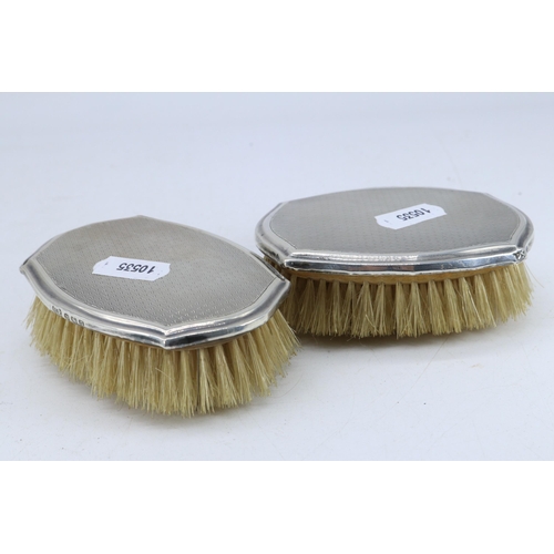 24 - Two silver backed hair brushes one a/f