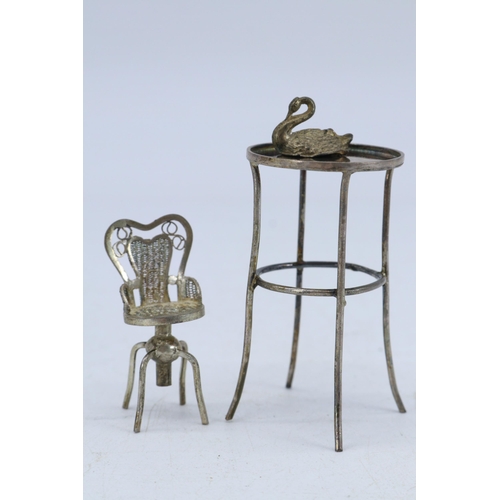 27 - White metal miniature chair, swan and plant table