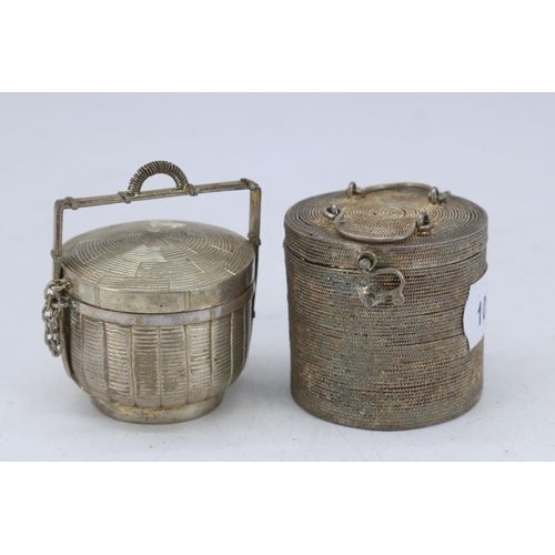 29 - Two Oriental white metal miniature baskets