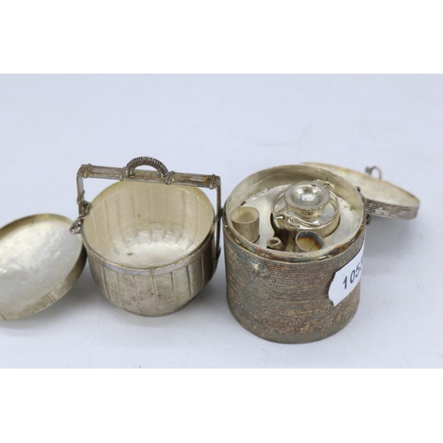 29 - Two Oriental white metal miniature baskets