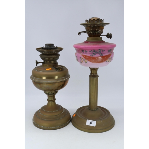 42 - Two oil lamps, one with flue.