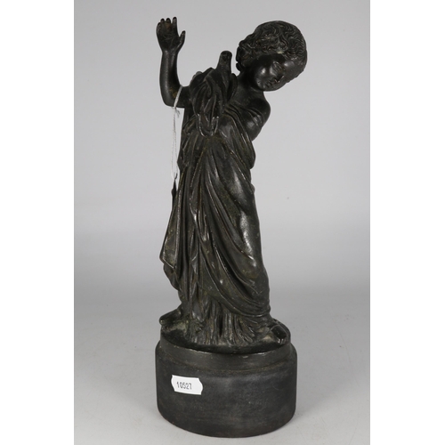 46 - Spelter sculpture of a child holding a bird