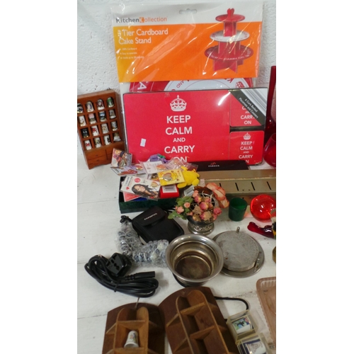 569 - Two carton of mixed house-clearance items including; thimbles, red / cranberry glass, MG posters etc... 