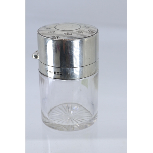 6 - A large silver topped glass perfume bottle