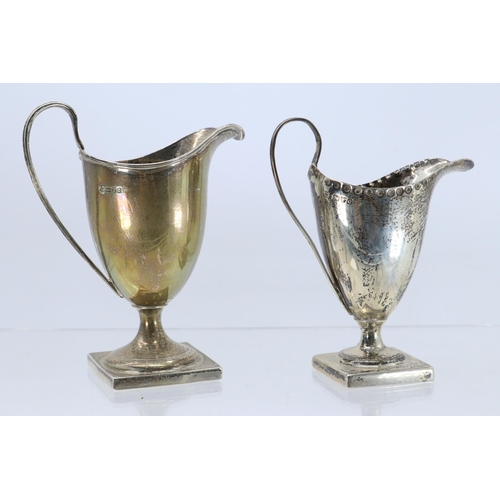 32 - Two silver hallmarked cream jugs both assayed for Chester (approx. weight 100g)