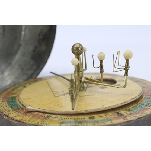 37 - Antique Orrery planetarium? encased inside a tin, diameter approx. 11cm