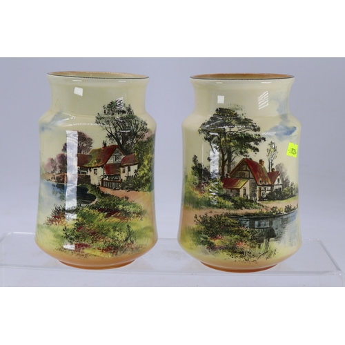 56 - A pair of Doulton Series ware vases D3647