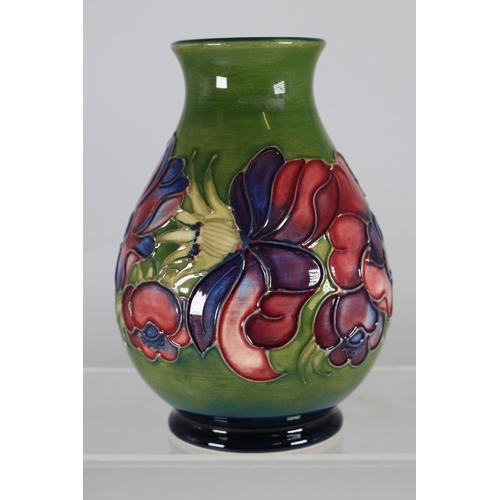 64 - Moorcroft small decorative vase, approx. 14cm high