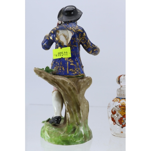 131 - Antique Derby figurine together with a Norfolk regiment cup and saucer and an Amorial crescent decor... 