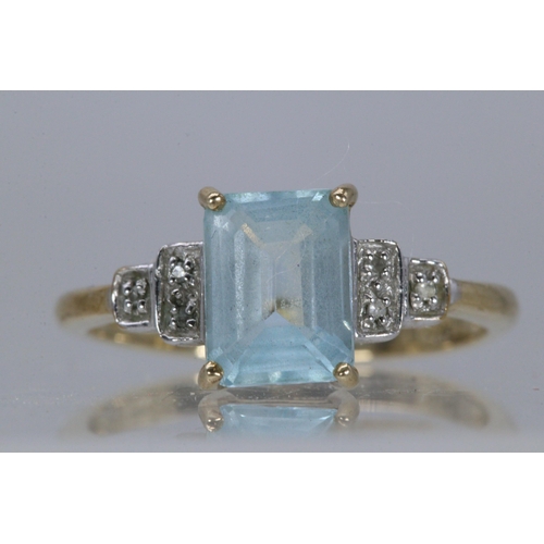 205 - A 9ct gold diamond and blue stone ring (approx weight 2.26g)