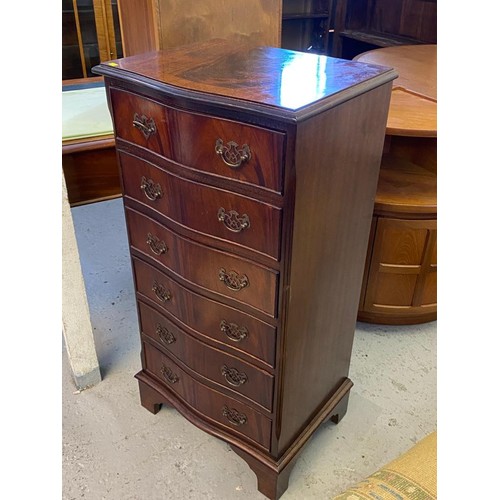 417 - A reproduction chest of drawers together with an open bookcase and another similar