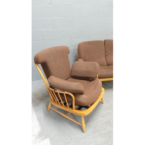 428 - An Ercol Windsor chair and matching two seater sofa. (chair seat pads need to be re-upholstered to c... 