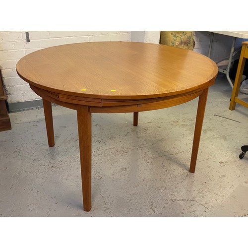 510 - A danish made Dyrlund extending dining table together with 2 carver chairs and four dining chairs (c... 