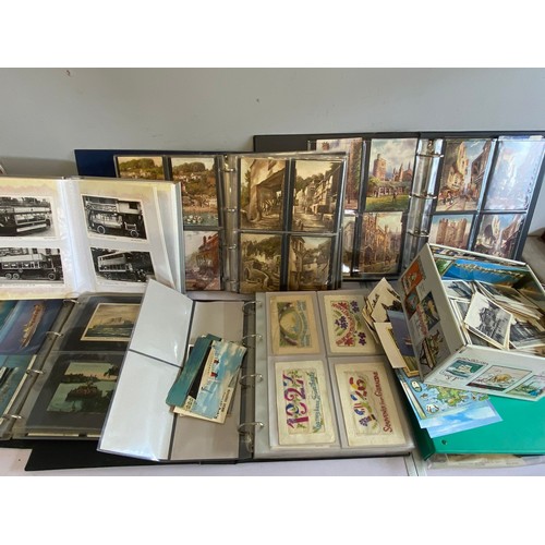 575 - Six albums of assorted vintage and later postcards, mainly printed including tucks, silks, one RP sh... 