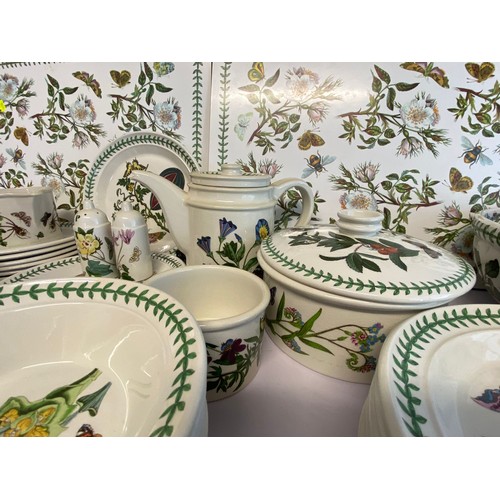 596 - A large selection of Portmeirion Botanic Garden tea, dinner and tableware, table mats, coaster etc. ... 