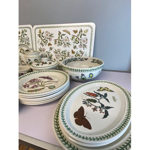 596 - A large selection of Portmeirion Botanic Garden tea, dinner and tableware, table mats, coaster etc. ... 