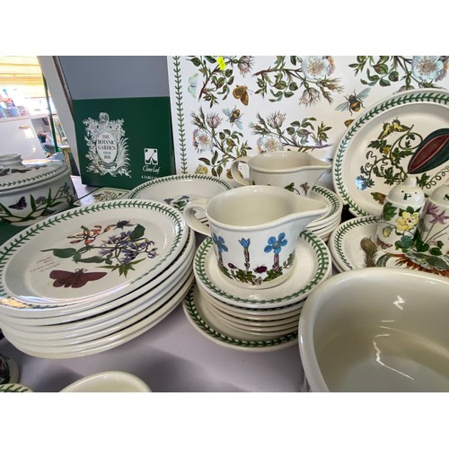 596 - A large selection of Portmeirion Botanic Garden tea, dinner and tableware, table mats, coaster etc. ... 