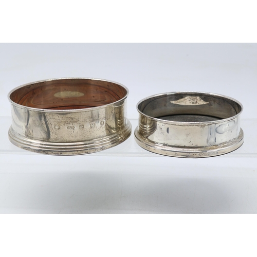 31 - Two silver hallmarked wine coasters