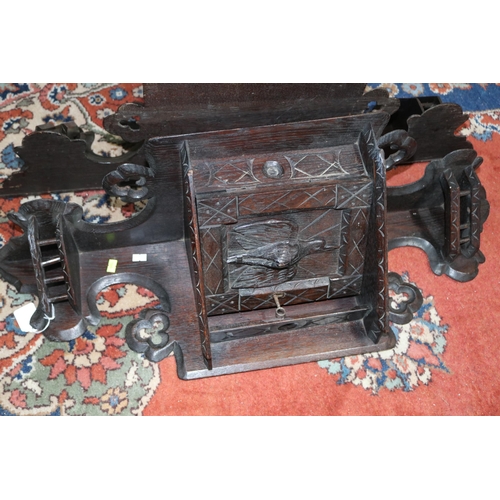 314 - Pair of Black Forest carved corner cabinets, c1900 - one key in office