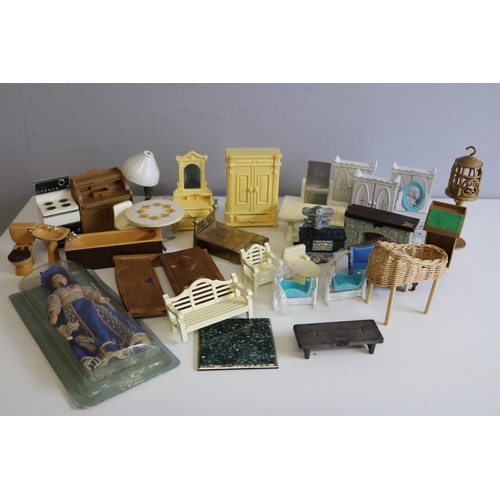 555 - A large box of assorted dolls house accessories some still in packaging