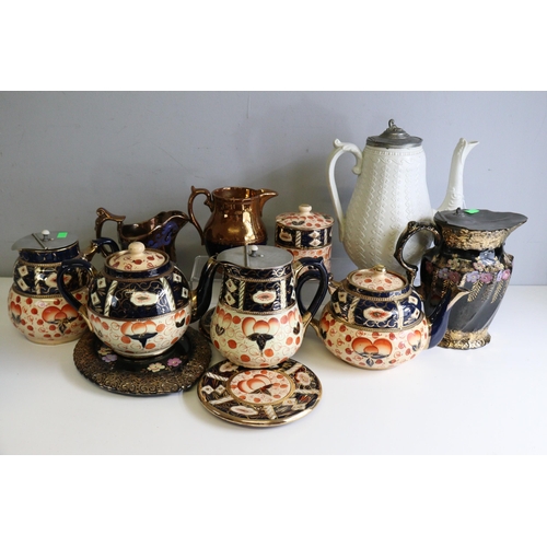 660 - A good quantity of antique Lustre ceramic items to include teapots and stands, jugs etc