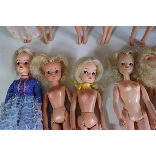 687 - Box of assorted various Sindy dolls