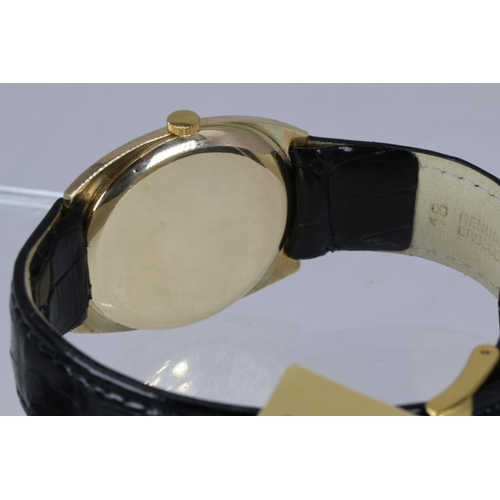 113 - A 9ct gold Zennith manual wind wristwatch 1972 refitted with crocodile strap