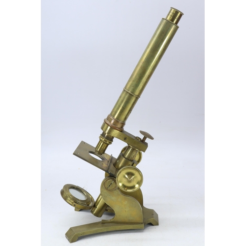 240 - Antique solid brass microscope, in glass fronted mahogany case, comes with spare eye pieces. Also a ... 