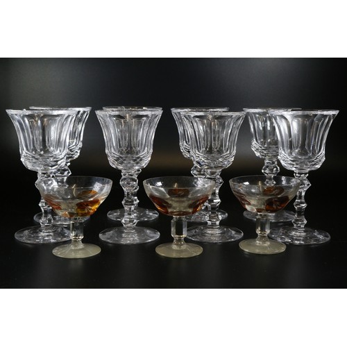 244 - Eight antique Waterford ? Tara? wine glasses, some showing chips together with three amber flash cut... 