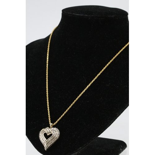 55 - 925 marked chain with heart pendant set with diamond stones (total weight approx. 10.4g)