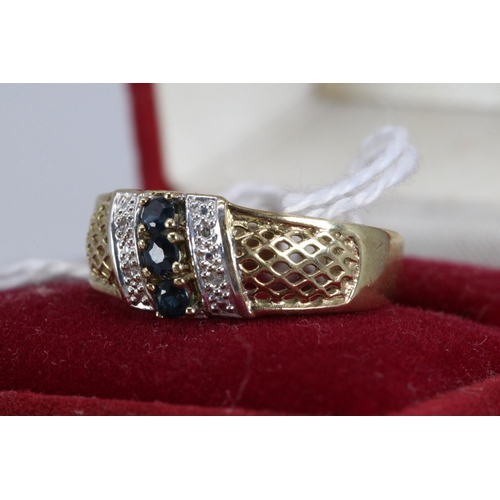 62 - A 9ct gold decorative sapphire and diamond chip ring (weight approx. 2g, Approx. size O)