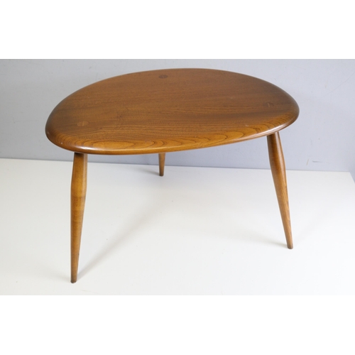 340 - Nest of three Ercol pebble tables