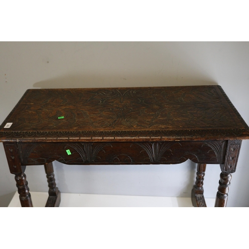 382 - Heavily carved oak hall table