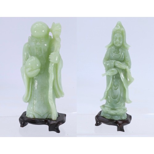 245 - Chinese jade figurine Immortal on wooden base together with another jade figurine on wooden stand.