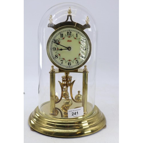 241 - A Kundo anniversary Clock with glass dome