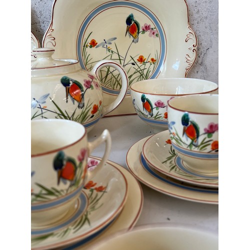 39 - Small quantity of hand painted Deco  Bursley Ware tea ware featuring a Kingfisher; including tea pot... 