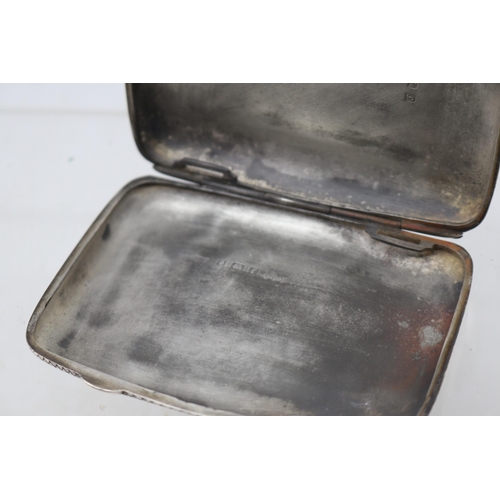 23 - A silver cigarette case