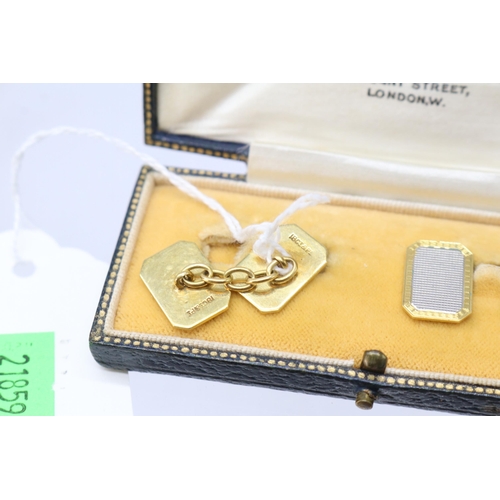 77 - A pair of Mappin & Webb 18ct gold and platinum cufflinks in fitted case (approx. weight 8.2g)