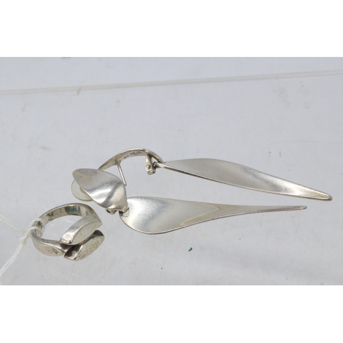 103 - A Charles Horner hat pin together with a Georg Jensen stainless steel bookmark, a pair of 925s Georg... 