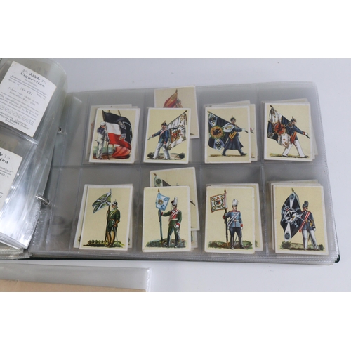 223 - A binder containing approx. 700 different loose pre-war German cigarette cards, along with a full se... 