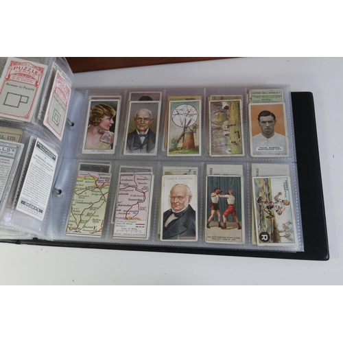 224 - A binder containing over 500 different cigarette cards - mostly from smaller makers, many with a fai... 